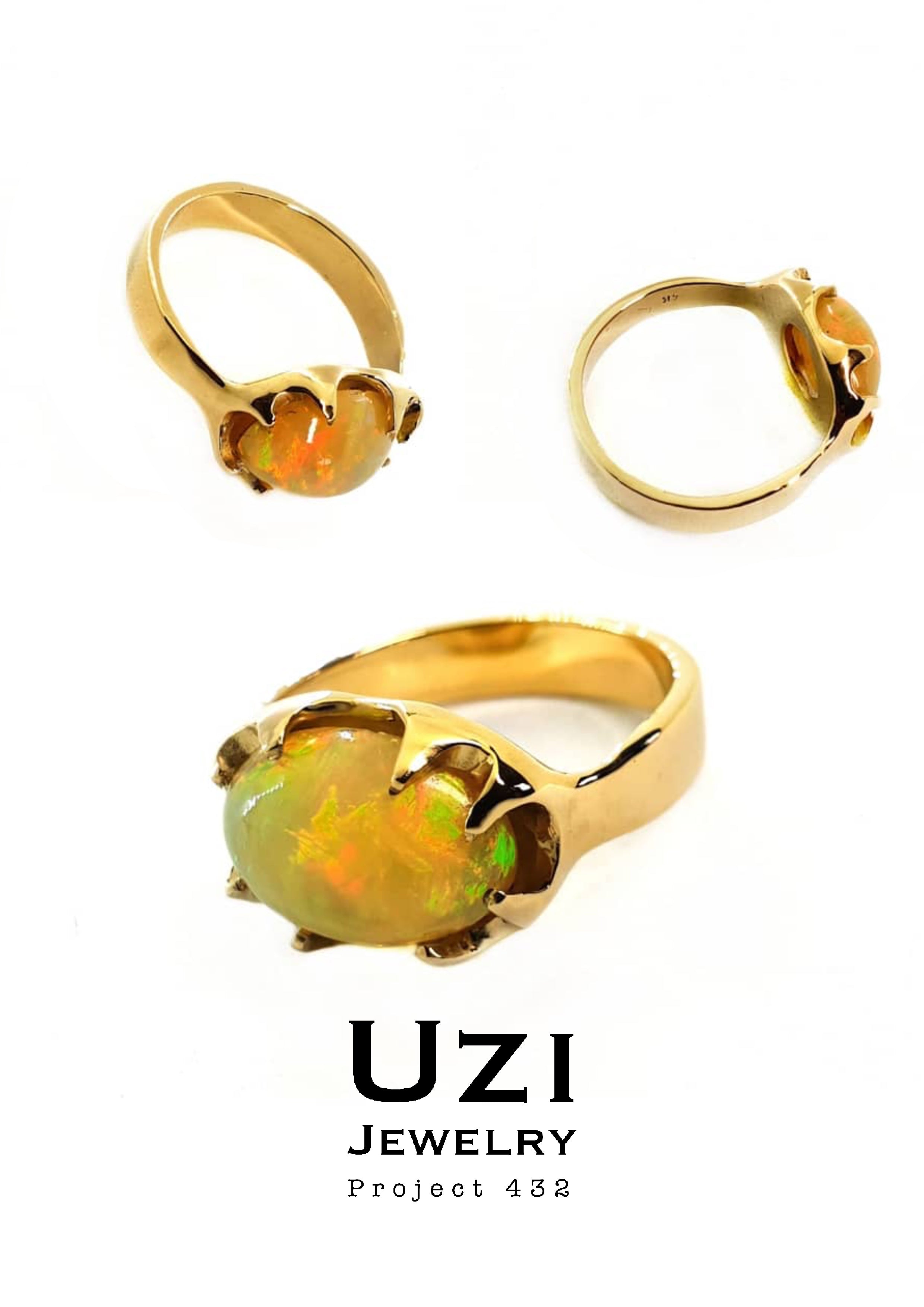 14K GOLD RING WITH CENTER NATURAL WELO OPAL & BLACK DIAMOND ON THE SIDE